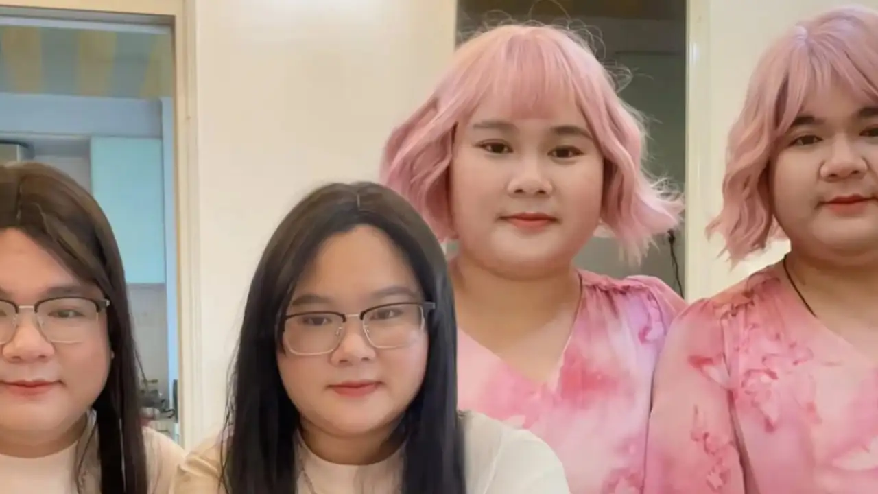 Китайская пара похожи друг на друга как близнецы.