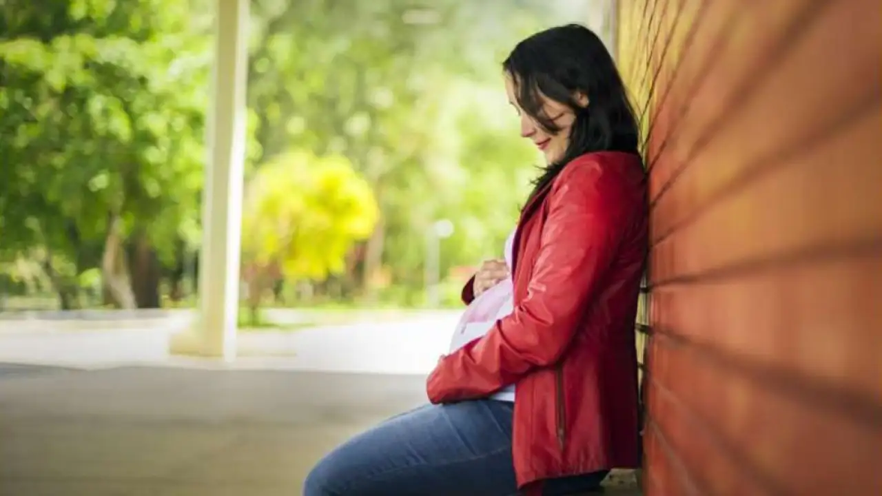 Беременная женщина.