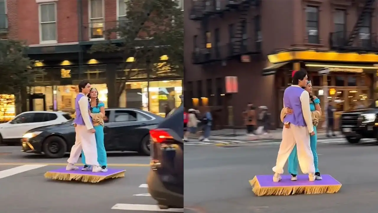 Алладин и Жасмин на улицах города.