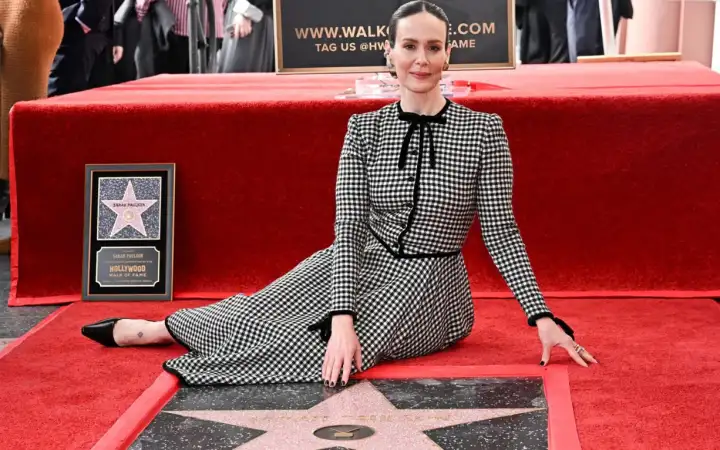 Сара Полсон.