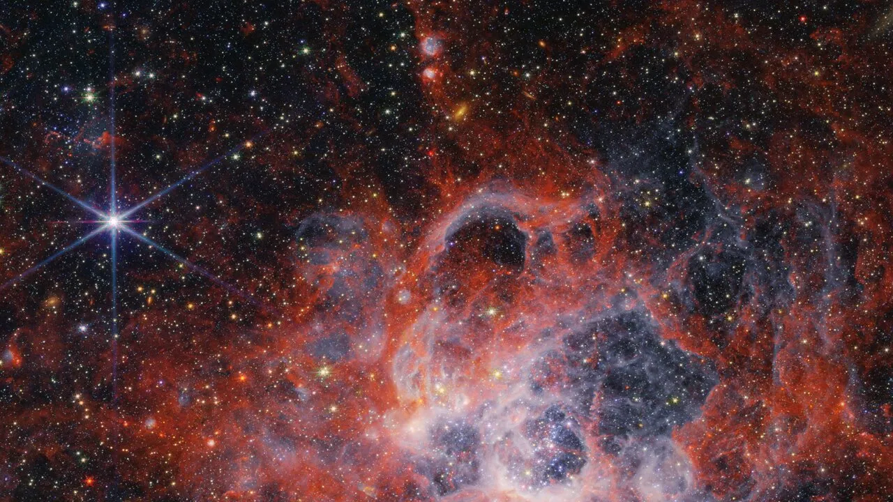 Область NGC 604, снятая камерой NIRCam. 