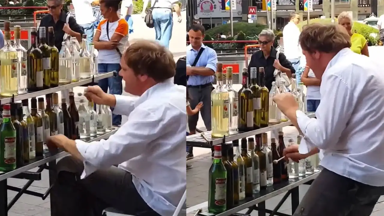 Композитор играет на бутылках.